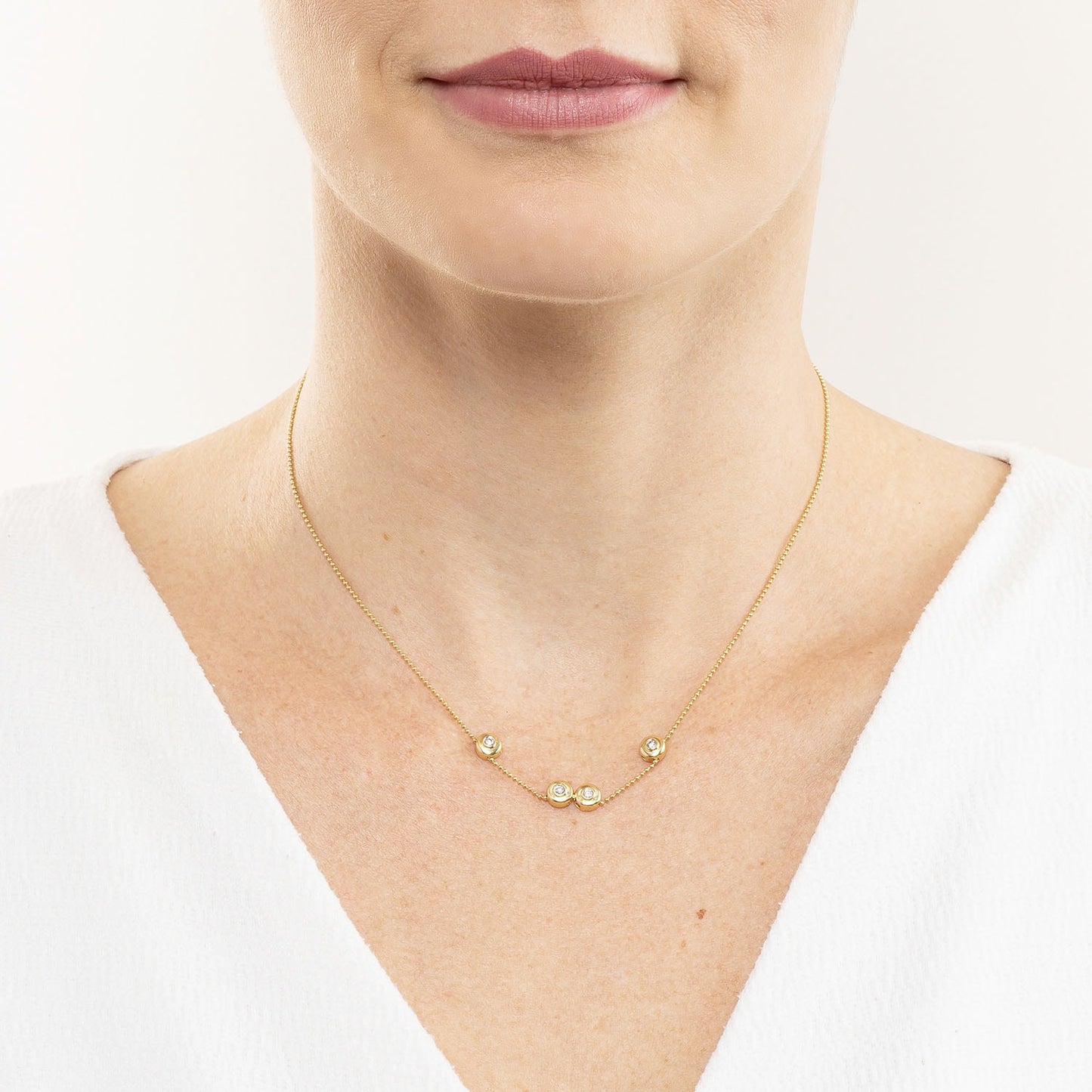 Colar ponto de luz com 0,20 ct de diamantes em ouro
