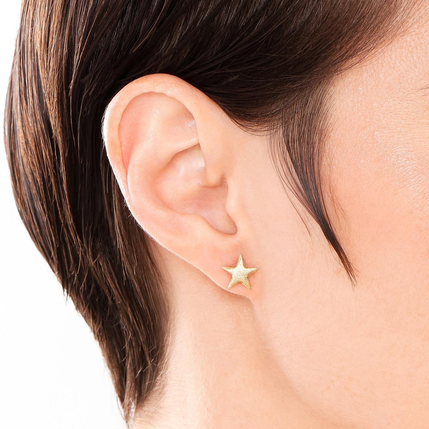 Brinco stud estrela em ouro amarelo