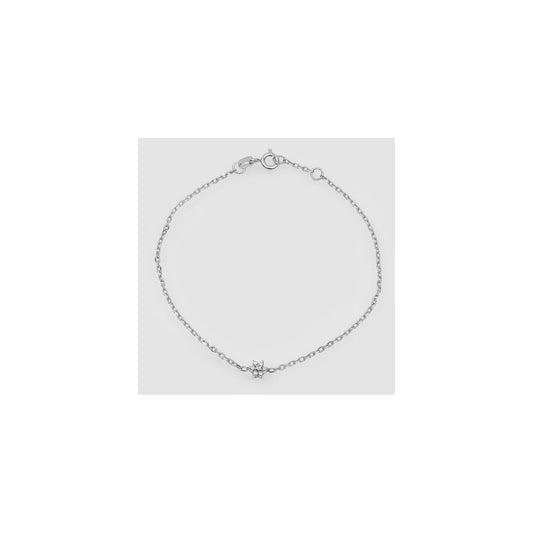 Pulseira maleável com flor e diamantes em ouro branco
