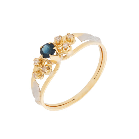 Anel pedraria com diamantes e safira em ouro